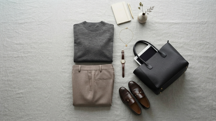 Flat-lay of a monochrome neutral outfit illustrating trending outfit ideas for 2026.